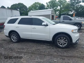 2016 Dodge Durango SXT with VIN 1C4RDHAG2GC330995, listed as a IAAI auction lot 42410612 with 118,412 mi miles and . Bid and sale history available at DreamBid. Image 13.