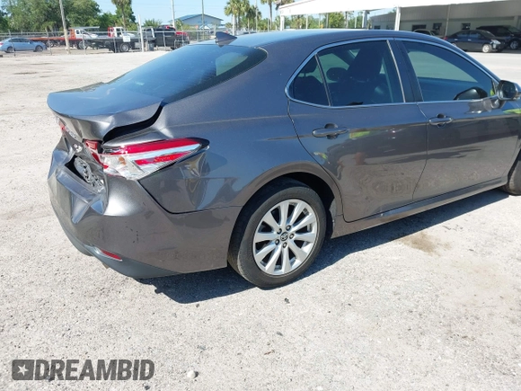 2019 Toyota Camry LE with VIN 4T1B11HK4KU286959, listed as a IAAI auction lot 42063344 with 92,481 mi miles and . Bid and sale history available at DreamBid. Image 4.