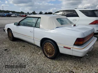 1994 Chrysler LeBaron z VIN 1C3EU4530RF259672, wystawiony jako Copart lot #80346444 z przebiegiem Nie podano mil oraz Szkody całkowita. Historia ofert i sprzedaży dostępna na DreamBid. Obrazek 2.