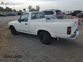 1993 Toyota Pickup DX with VIN JT4RN81P4P5168613, listed as a Copart auction lot 82611524 with 200,408 mi miles and Clean title. Bid and sale history available at DreamBid. Image 2.