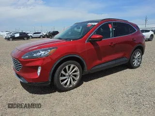 2021 Ford Escape Titanium z VIN 1FMCU9J94MUA31359, wystawiony jako Copart lot #55424035 z przebiegiem 71 346 mil mil oraz Czysty tytuł • Clean title. Historia ofert i sprzedaży dostępna na DreamBid. Obrazek 1.