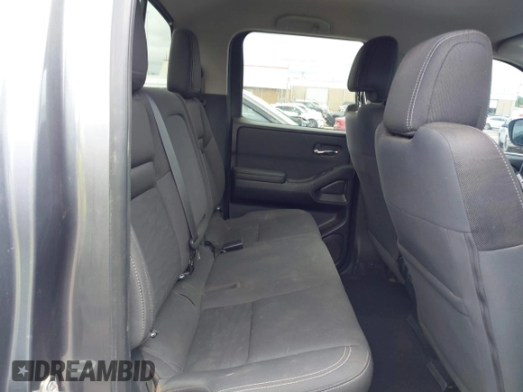2023 Nissan Frontier SV with VIN 1N6ED1EK3PN603948, listed as a IAAI auction lot 42333677 with 38,779 mi miles and . Bid and sale history available at DreamBid. Image 8.