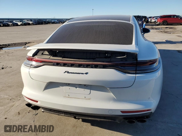2022 Porsche Panamera z VIN WP0AJ2A73NL100639, wystawiony jako Copart lot #81958053 z przebiegiem 3 399 mil mil oraz Czysty tytuł • Clean title. Historia ofert i sprzedaży dostępna na DreamBid. Obrazek 6.