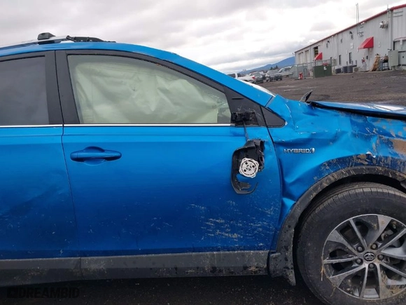 2016 Toyota RAV4 Hybrid XLE with VIN JTMRJREVXGD043129, listed as a IAAI auction lot 41786071 with 97,919 mi miles. Bid and sale history available at carsss.com. Image 13.