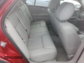 2011 Cadillac DTS Premium Collection z VIN 1G6KH5E66BU122873, wystawiony jako Copart lot #55515185 z przebiegiem 84 092 mil mil oraz Szkoda całkowita • Salvage title. Historia ofert i sprzedaży dostępna na DreamBid. Obrazek 10.