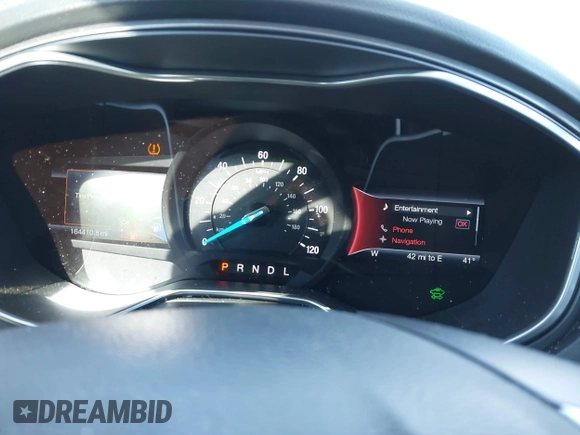 2016 Ford Fusion Titanium Hybrid with VIN 3FA6P0RU7GR364573, listed as a IAAI auction lot 41298298 with 189,900 mi miles. Bid and sale history available at carsss.com. Image 7.