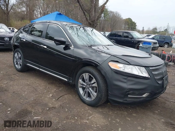 2014 Honda Crosstour EX-L z VIN 5J6TF2H57EL004084, wystawiony jako IAAI lot #42020402 z przebiegiem 116 356 mil mil oraz . Historia ofert i sprzedaży dostępna na DreamBid. Obrazek 1.