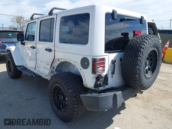 2017 Jeep Wrangler Unlimited Sahara with VIN 1C4BJWEG5HL588535, listed as a IAAI auction lot 42013571 with 70,012 mi miles. Bid and sale history available at carsss.com. Image 3.