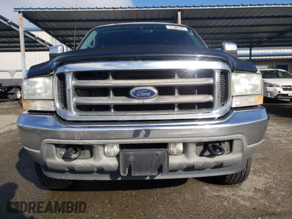 2002 Ford Super Duty F-250 XL with VIN 1FTNW21L52EA58748, listed as a Copart auction lot 39513234 with 142,808 mi miles and Clean Title. Bid and sale history available at carsss.com. Image 5.