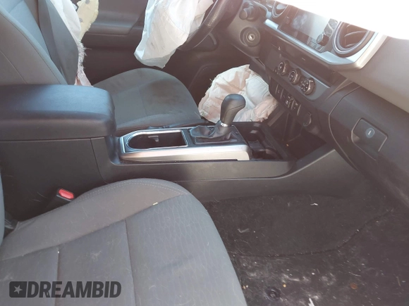 2018 Toyota Tacoma SR5 with VIN 5TFAZ5CN5JX066115, listed as a IAAI auction lot 41816133 with 70,283 mi miles and . Bid and sale history available at DreamBid. Image 5.