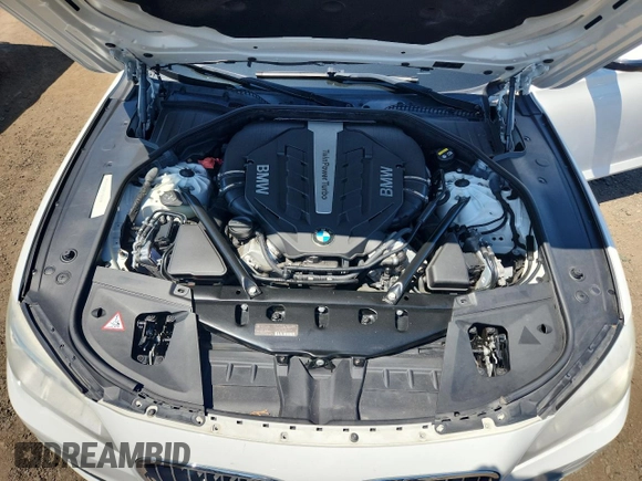 2015 BMW 7 Series 750Li with VIN WBAYE8C59FD782291, listed as a Copart auction lot 65119745 with 159,479 mi miles and Salvage title. Bid and sale history available at DreamBid. Image 11.