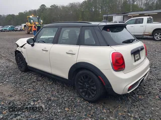 2016 MINI Cooper Hardtop 4 Door S with VIN WMWXU3C52G2D30121, listed as a IAAI auction lot 41521841 with 82,334 mi miles. Bid and sale history available at carsss.com. Image 3.
