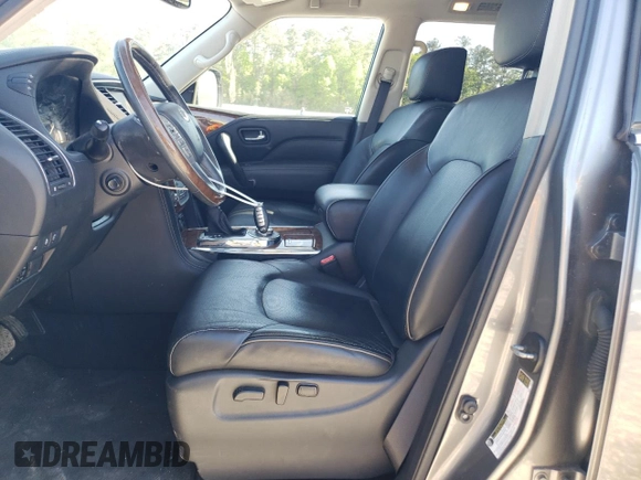 2018 Infiniti QX80 z VIN JN8AZ2NC7J9440940, wystawiony jako Copart lot #53384735 z przebiegiem 57 875 mil mil oraz Czysty tytuł • Clean title. Historia ofert i sprzedaży dostępna na DreamBid. Obrazek 7.
