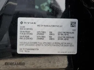 2022 Rivian R1T Adventure z VIN 7FCTGAAA5NN015734, wystawiony jako Copart lot #44019715 z przebiegiem 27 542 mil mil oraz Szkody całkowita. Historia ofert i sprzedaży dostępna na DreamBid. Obrazek 14.