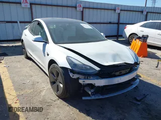 2022 Tesla Model 3 with VIN 5YJ3E1EA7NF103513, listed as a IAAI auction lot 41643592 with 35,631 mi miles and . Bid and sale history available at DreamBid. Image 1.