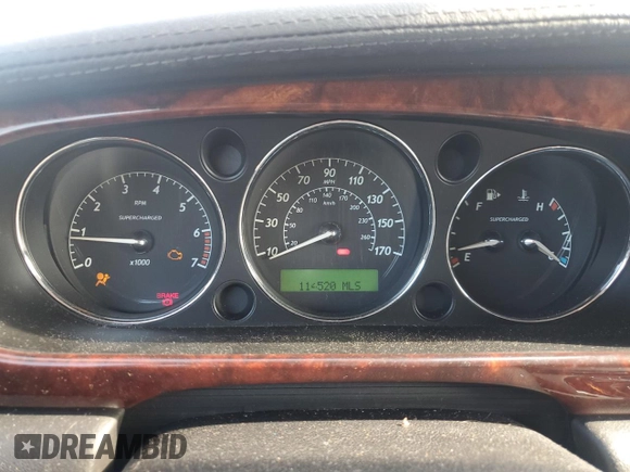 2005 Jaguar XJ Vanden Plas with VIN SAJWA82B05TG47030, listed as a Copart auction lot 41040574 with 114,520 mi miles and Salvage Title. Bid and sale history available at carsss.com. Image 9.