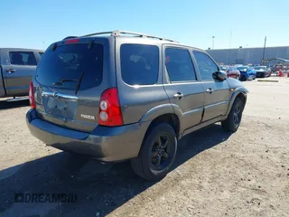 2005 Mazda Tribute S with VIN 4F2CZ06175KM49643, listed as a IAAI auction lot 41397843 with 185,088 mi miles and . Bid and sale history available at carsss.com. Image 4.