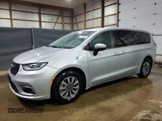 2023 Chrysler Pacifica Hybrid Touring L z VIN 2C4RC1L72PR618319, wystawiony jako Copart lot #60305115 z przebiegiem 52 906 mil mil oraz Czysty tytuł • Clean title. Historia ofert i sprzedaży dostępna na DreamBid. Obrazek 1.
