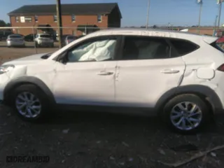 2019 Hyundai Tucson Value with VIN KM8J3CA4XKU894613, listed as a IAAI auction lot 41527548 with 139,734 mi miles. Bid and sale history available at carsss.com. Image 15.