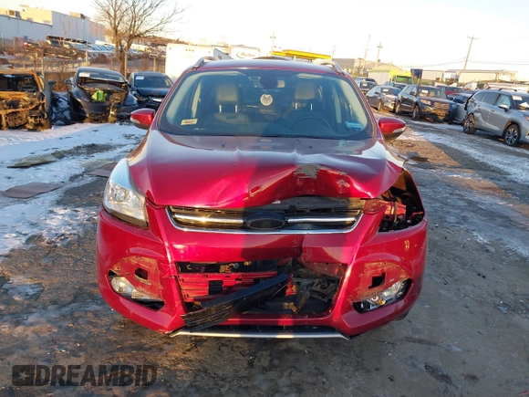 2015 Ford Escape Titanium with VIN 1FMCU9J99FUB34831, listed as a IAAI auction lot 41278305 with 59,658 mi miles and . Bid and sale history available at DreamBid. Image 12.