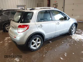 2009 Suzuki SX4 Man Touring Pkg AWD with VIN JS2YB417X95100192, listed as a IAAI auction lot 41618761 with 172,687 mi miles. Bid and sale history available at carsss.com. Image 4.
