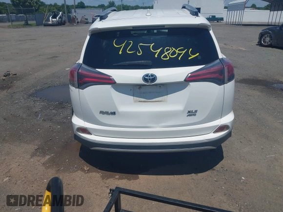 2016 Toyota RAV4 XLE with VIN JTMRFREV0GJ073114, listed as a IAAI auction lot 42548094 with 119,431 mi miles and . Bid and sale history available at DreamBid. Image 16.