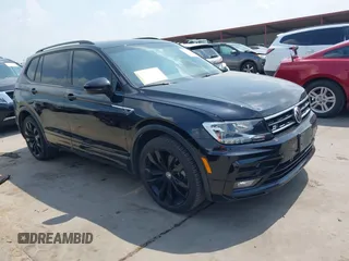 2021 Volkswagen Tiguan SE z VIN 3VV3B7AX0MM047478, wystawiony jako IAAI lot #42144239 z przebiegiem 55 468 mil mil oraz . Historia ofert i sprzedaży dostępna na DreamBid. Obrazek 1.