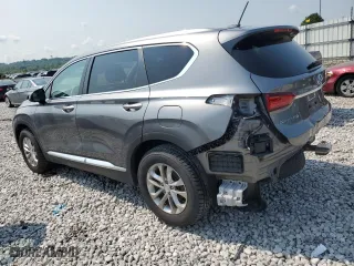 2019 Hyundai Santa Fe SE with VIN 5NMS23AD5KH104668, listed as a Copart auction lot 63483564 with 63,468 mi miles and Salvage Title. Bid and sale history available at carsss.com. Image 2.