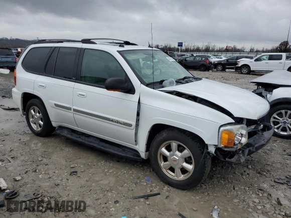2004 GMC Envoy SLT with VIN 1GKDT13SX42404837, listed as a Copart auction lot 84515994 with 184,153 mi miles and Salvage Title. Bid and sale history available at carsss.com. Image 4.