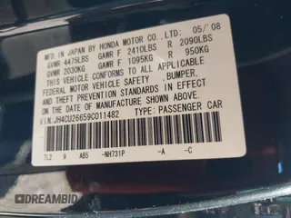 2009 Acura TSX with VIN JH4CU26659C011482, listed as a IAAI auction lot 42212079 with 243,119 mi miles. Bid and sale history available at carsss.com. Image 9.