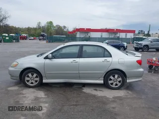 2003 Toyota Corolla CE with VIN 2T1BR32E13C038971, listed as a IAAI auction lot 42027458 with 227,808 mi miles. Bid and sale history available at carsss.com. Image 14.
