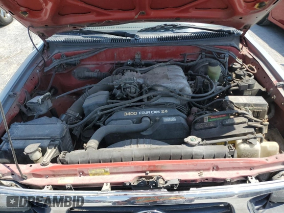 1993 Toyota Pickup DLX z VIN 4TAVN13D3PZ113874, wystawiony jako Copart lot #65384333 z przebiegiem 225 463 mil mil oraz Szkoda całkowita • Salvage title. Historia ofert i sprzedaży dostępna na DreamBid. Obrazek 13.