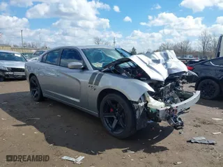 2014 Dodge Charger RT 100th Anniversary with VIN 2C3CDXCTXEH113929, listed as a IAAI auction lot 41853443 with 114,080 mi miles. Bid and sale history available at carsss.com. Image 1.