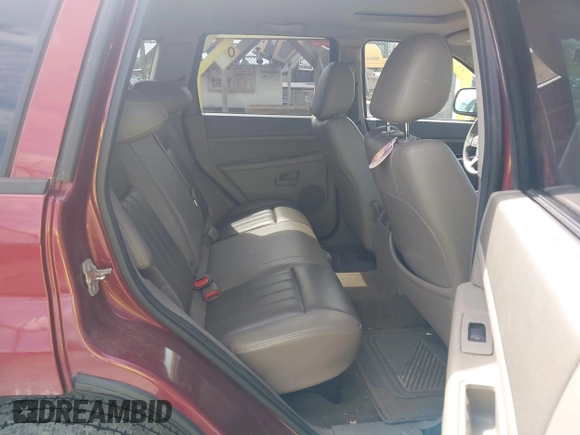 2007 Jeep Grand Cherokee Laredo z VIN 1J8HR48N87C609080, wystawiony jako IAAI lot #42391793 z przebiegiem 159 096 mil mil oraz . Historia ofert i sprzedaży dostępna na DreamBid. Obrazek 8.