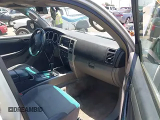 2003 Toyota 4Runner SR5 z VIN JTEZU14R830003562, wystawiony jako IAAI lot #42408101 z przebiegiem 269 316 mil mil oraz . Historia ofert i sprzedaży dostępna na DreamBid. Obrazek 5.