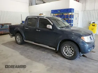 2014 Nissan Frontier SV with VIN 1N6AD0ER1EN770604, listed as a Copart auction lot 52885885 with 130,971 mi miles and Salvage Title. Bid and sale history available at DreamBid. Image 4.