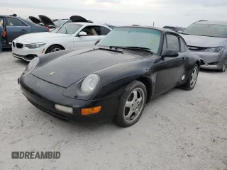 1996 Porsche 911 with VIN WP0AA299XTS320885, listed as a Copart auction lot 74113954 with Not provided miles and Salvage title. Bid and sale history available at DreamBid. Image 1.