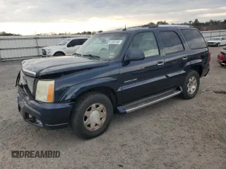 2004 Cadillac Escalade z VIN 1GYEK63N74R118889, wystawiony jako Copart lot #51055185 z przebiegiem 267 760 mil mil oraz Czysty tytuł • Clean title. Historia ofert i sprzedaży dostępna na DreamBid. Obrazek 1.