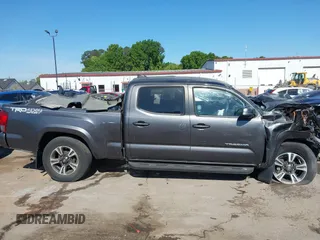2017 Toyota Tacoma SR5 with VIN 3TMDZ5BN8HM030014, listed as a IAAI auction lot 42044102 with Not provided miles and . Bid and sale history available at DreamBid. Image 12.