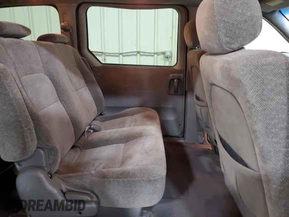 2003 Kia Sedona LX with VIN KNDUP131736467120, listed as a Copart auction lot 61992234 with 133,222 mi miles and Salvage Title. Bid and sale history available at carsss.com. Image 11.