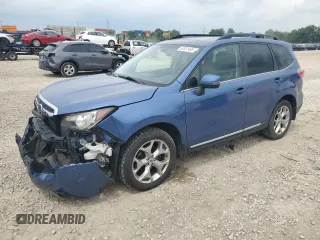 2017 Subaru Forester Touring with VIN JF2SJAWCXHH570454, listed as a Copart auction lot 63831465 with 101,186 mi miles and Salvage title. Bid and sale history available at DreamBid. Image 1.