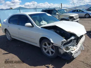 2002 Nissan Maxima GXE with VIN JN1DA31D82T427450, listed as a IAAI auction lot 41867838 with 143,879 mi miles and . Bid and sale history available at DreamBid. Image 1.