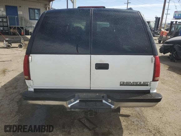 1997 Chevrolet Suburban with VIN 1GNEC16R5VJ301591, listed as a Copart auction lot 75965054 with 213,321 mi miles and Salvage Title. Bid and sale history available at carsss.com. Image 6.