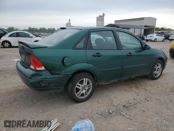 2000 Ford Focus SE z VIN 1FAFP3438YW379761, wystawiony jako Copart lot #58156125 z przebiegiem 103 816 mil mil oraz Szkoda całkowita • Salvage title. Historia ofert i sprzedaży dostępna na DreamBid. Obrazek 3.