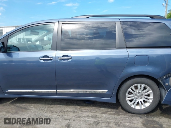 2016 Toyota Sienna XLE with VIN 5TDYK3DC0GS766059, listed as a IAAI auction lot 42214738 with 143,001 mi miles and . Bid and sale history available at DreamBid. Image 14.