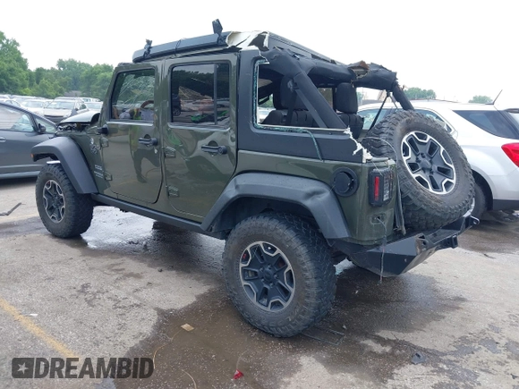 2016 Jeep Wrangler Unlimited Sport with VIN 1C4BJWDG3GL140326, listed as a IAAI auction lot 42385929 with 92,428 mi miles and . Bid and sale history available at DreamBid. Image 3.