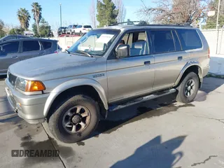 1999 Mitsubishi Montero Sport XLS with VIN JA4LS31H3XP034040, listed as a IAAI auction lot 41533558 with 265,800 mi miles. Bid and sale history available at carsss.com. Image 2.