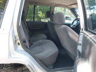1998 Jeep Grand Cherokee Laredo with VIN 1J4GZ58S6WC154415, listed as a IAAI auction lot 42331831 with 163,723 mi miles and . Bid and sale history available at DreamBid. Image 8.
