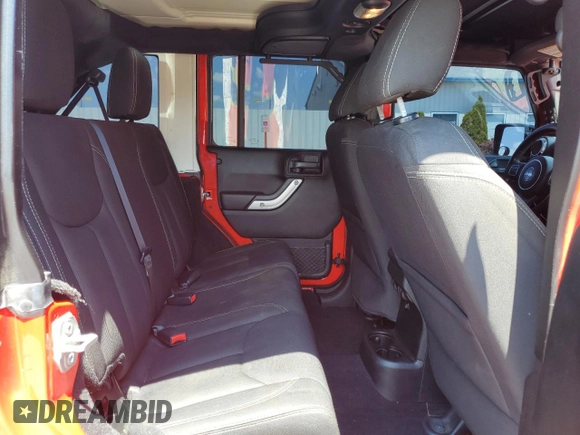 2018 Jeep Wrangler Unlimited Sahara with VIN 1C4BJWEG4JL802145, listed as a Copart auction lot 61931555 with 119,681 mi miles and Salvage title. Bid and sale history available at DreamBid. Image 11.