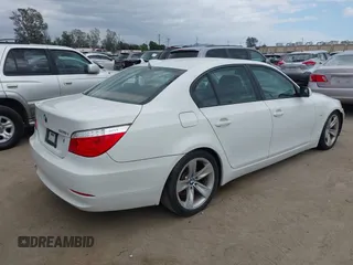 2009 BMW 5 Series 528i with VIN WBANU53529C121927, listed as a IAAI auction lot 42063066 with 195,322 mi miles and . Bid and sale history available at carsss.com. Image 4.